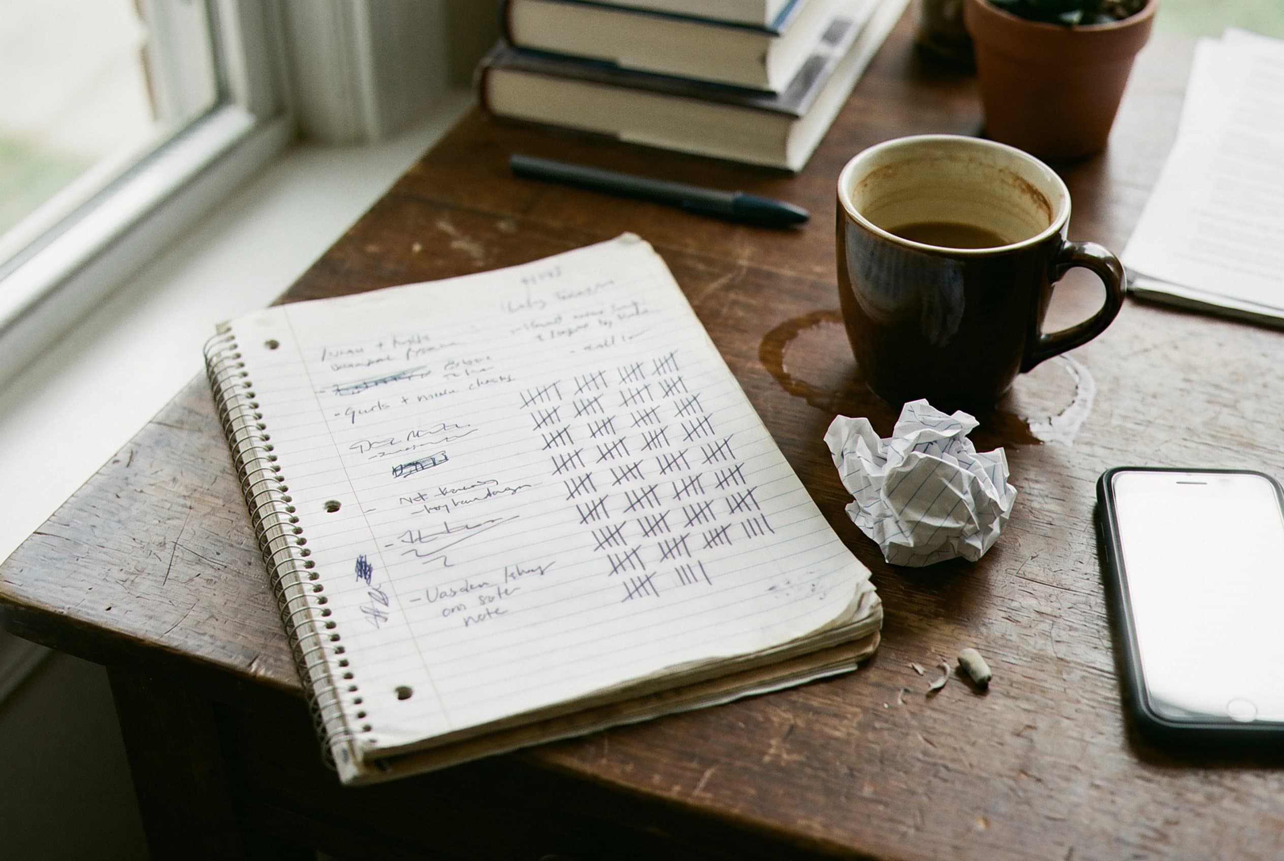 Notebook full of missed call notes.